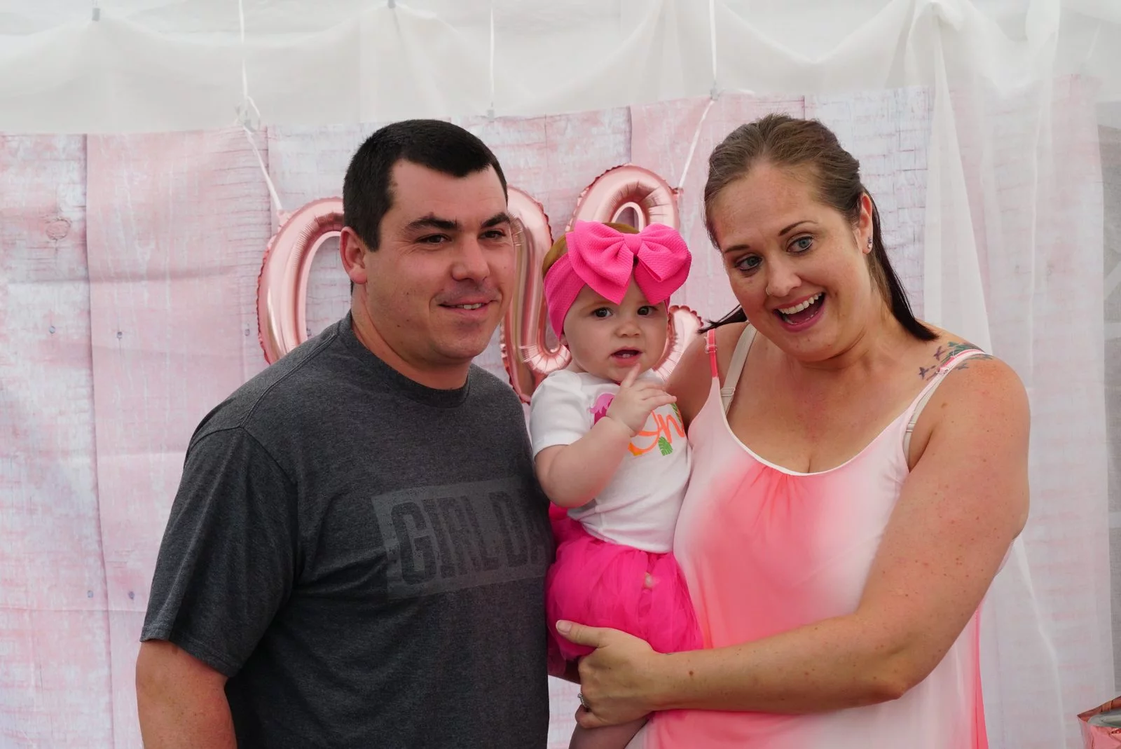 family pink photo booth portrait