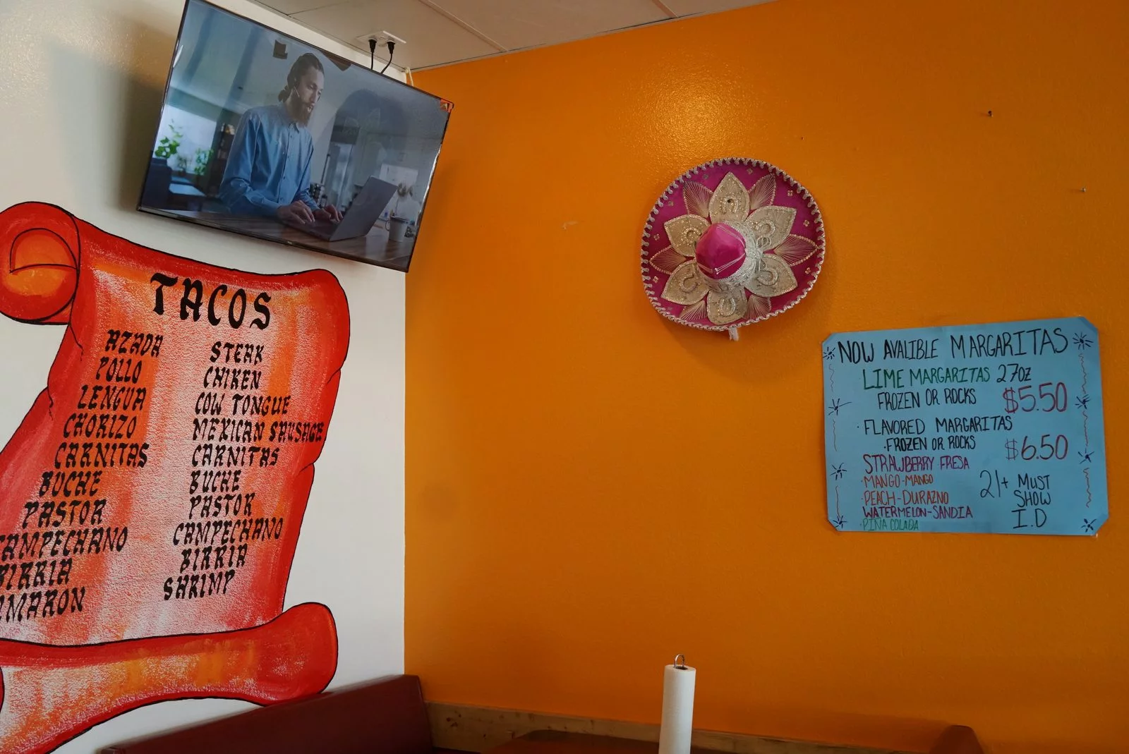 orange taco shop menu wall